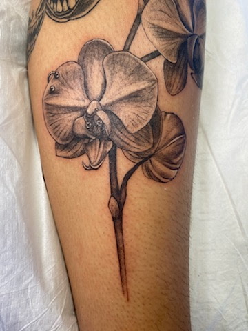 Color raven tattoo at Darkstar Tattoo Riverside CA