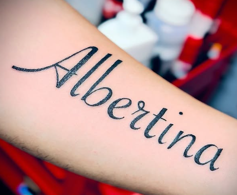 Fine line script lettering tattoo at Darkstar Tattoo Riverside CA