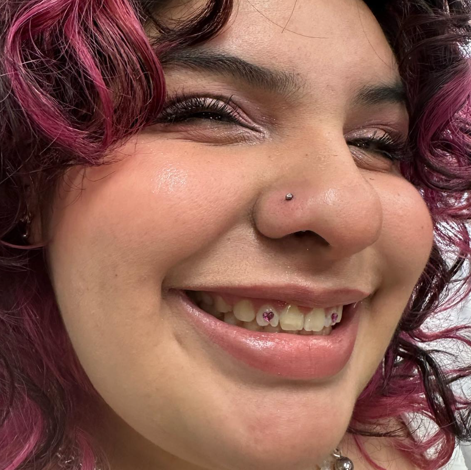 Pink heart tooth gems at Darkstar Tattoo Riverside CA