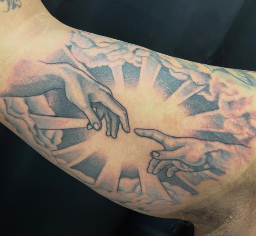 Black and grey religious Creation of Adam tattoo by Looney at Darkstar Tattoo Riverside CA