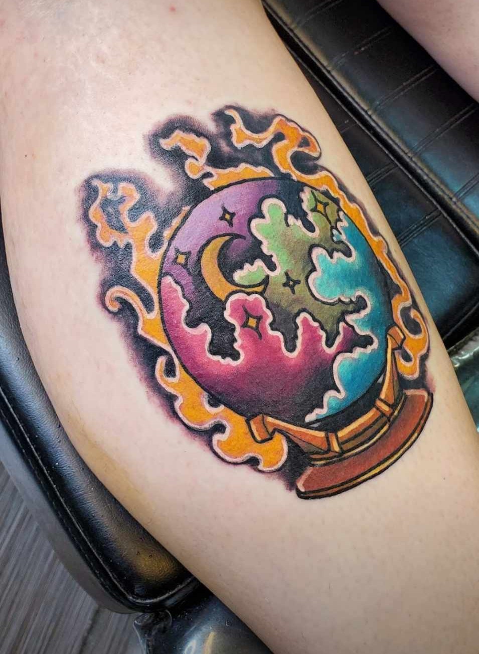 Color crystal ball fire leg tattoo at Darkstar Tattoo Riverside CA