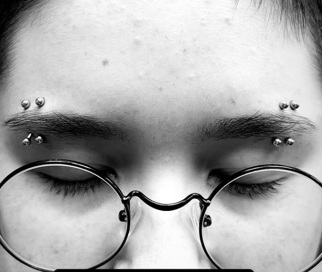 Eyebrow piercing by Nick Sida at Darkstar Tattoo