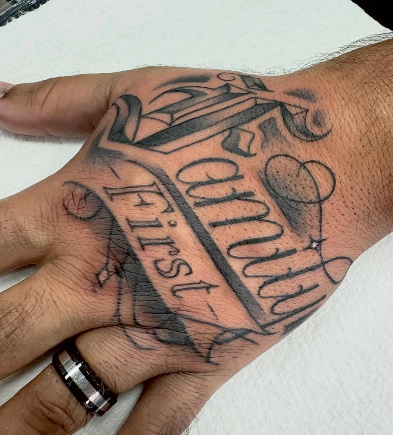 Black and grey hand script tattoo by Looney at Darkstar Tattoo Riverside CA