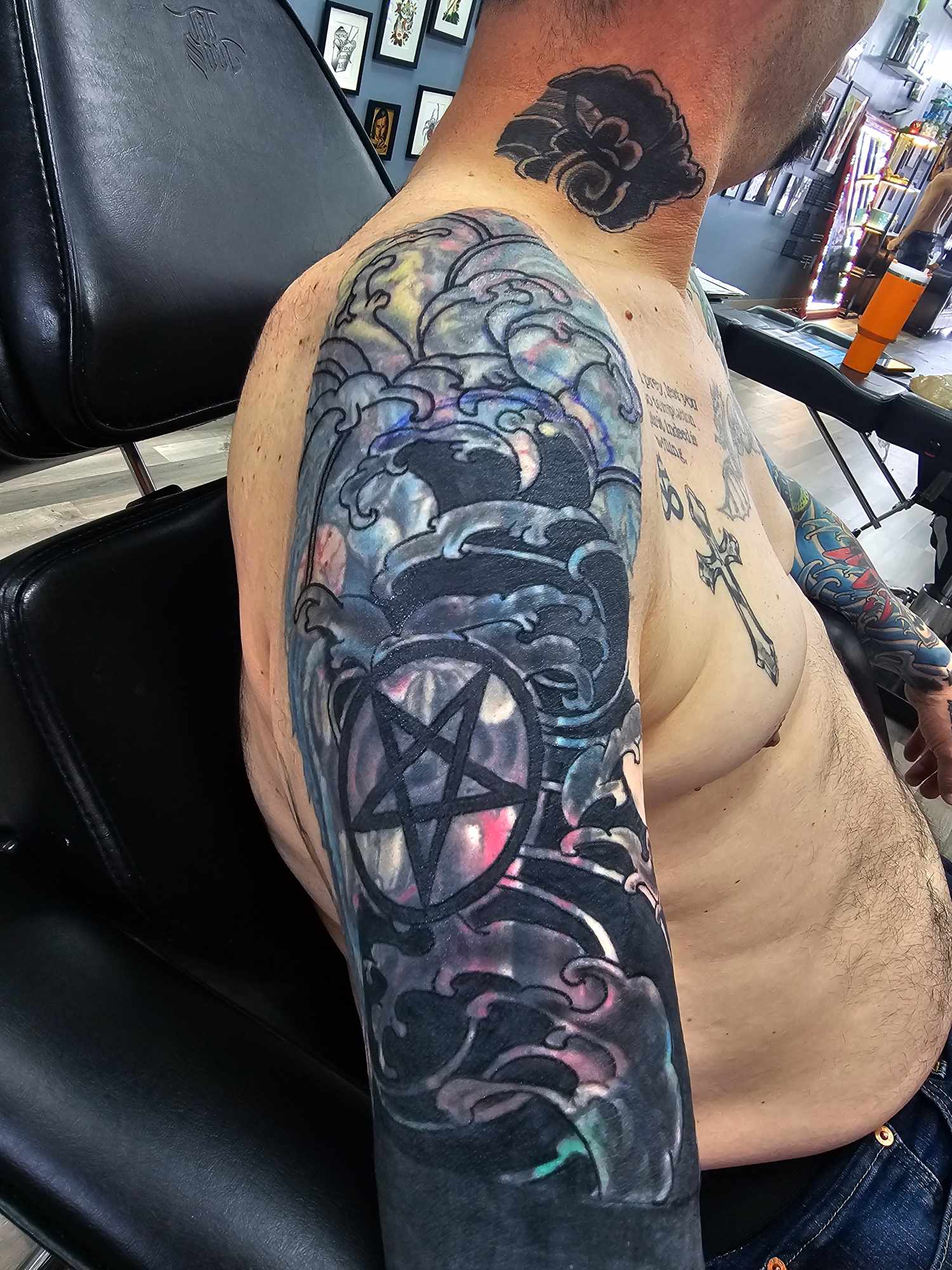 Pentagram smoke color sleeve tattoo at Darkstar Tattoo Riverside CA