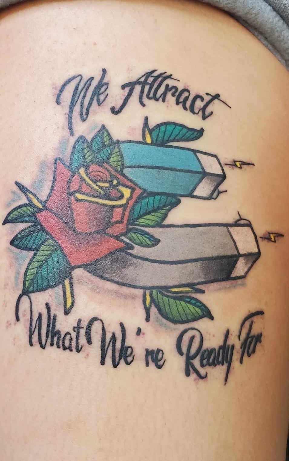 We attract what we're ready for lettering tattoo at Darkstar Tattoo Riverside CA